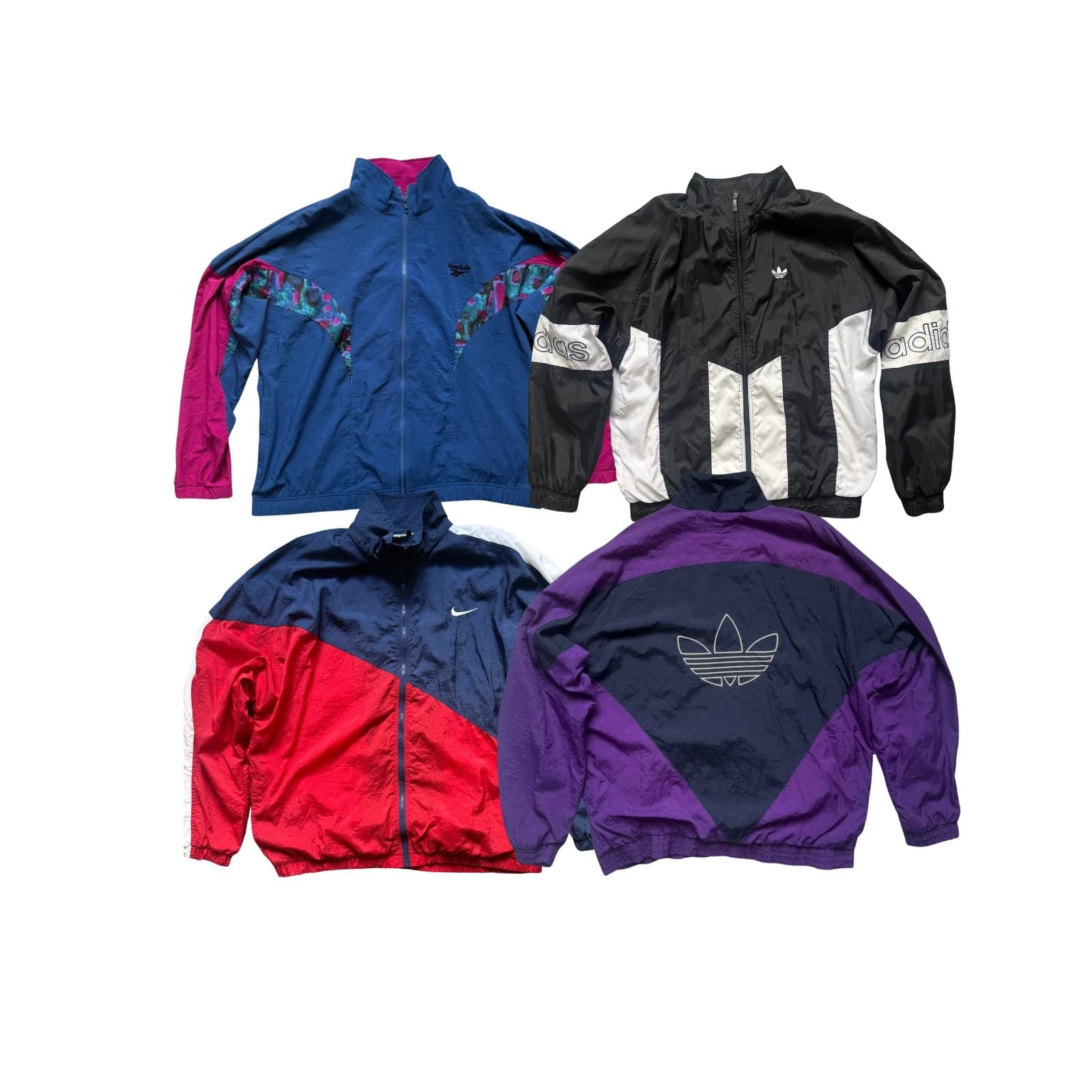 Jackets — Four festival track jackets on white: a blue and pink Reebok shell, a black and white Adidas taped track top, a navy and red Nike shell and a purple Adidas trefoil jacket.