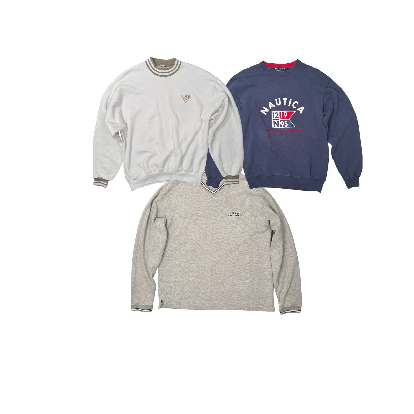 Three premium vintage crewnecks laid out on white: a white Guess sweatshirt with tipped ribbing, a navy Nautica Sailsports sweatshirt and a grey Chaps Ralph Lauren V-neck.