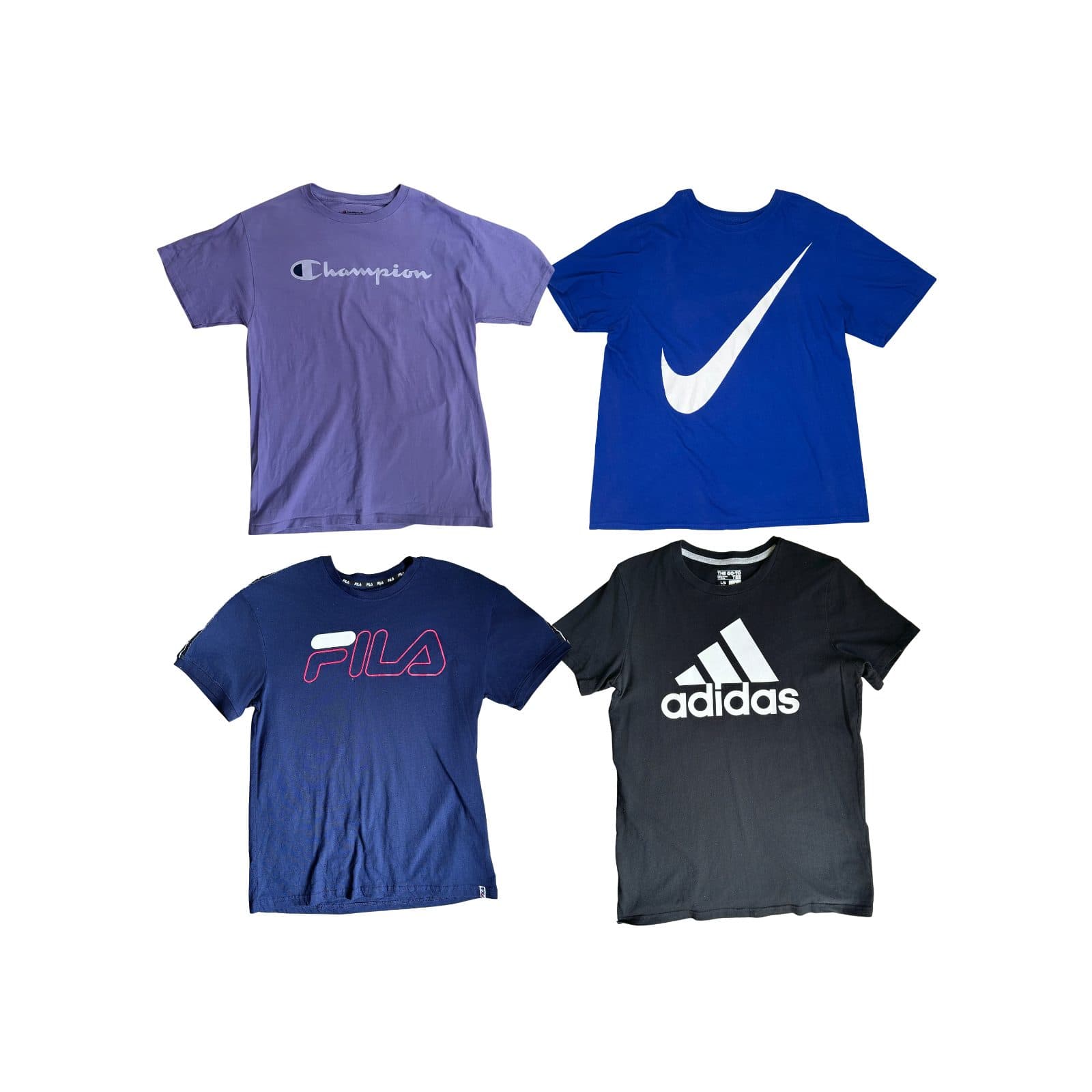 Four branded vintage t-shirts laid flat on white: a purple Champion script tee, a blue Nike swoosh tee, a navy Fila logo tee and a black adidas trefoil tee.